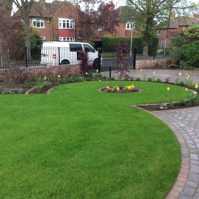 New lawn and design and Drivesys original cobble front driveway