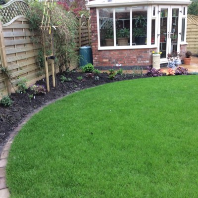 New lawn and design with Indian Stone paving