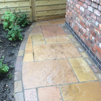 New lawn and design with Indian Stone paving