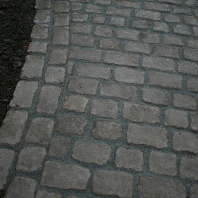 New lawn and design and Drivesys original cobble front driveway