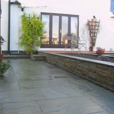 Cedar Wood Decking with 2-Tier Pond and Kandela Grey Paving